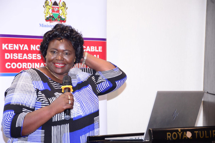A lady delivering keynote speech