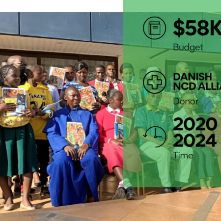 Children displaying donated books jpg