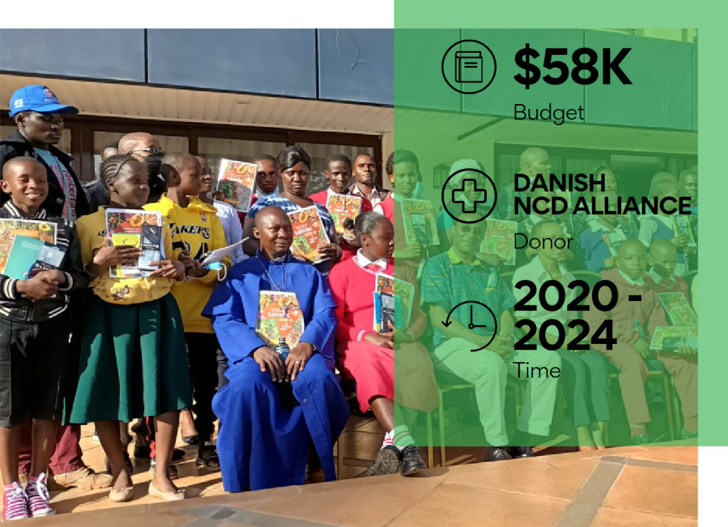 Children displaying donated books jpg